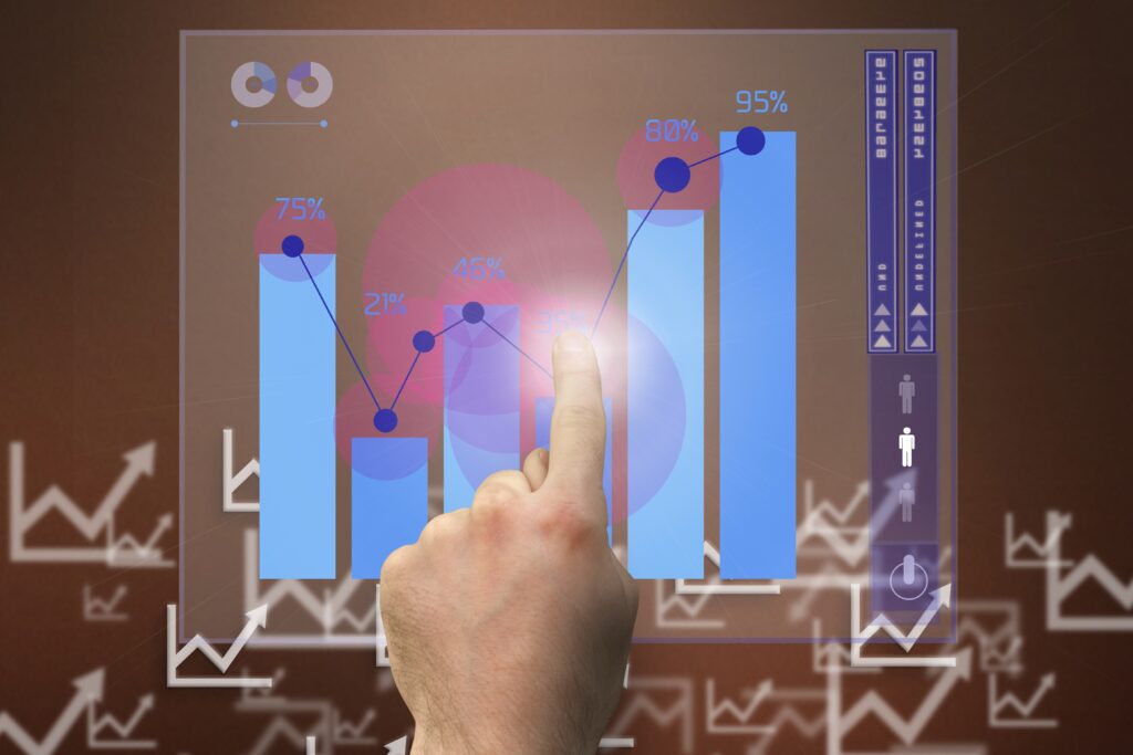 Tráfego Pago Como Fazer: 4 Passos Essenciais para Começar 2 dedo que pressiona um grafico digital